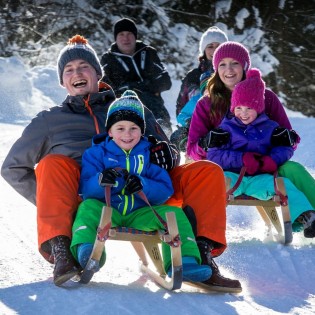 Rodelspaß in Radstadt in Ski amadé Nachtrodeln auf der beleuchteten Rodelstrecke am Königslehen © Salzburger Sportwelt_Tom Lamm